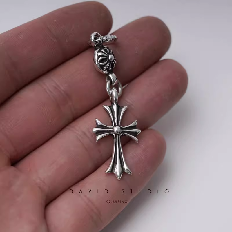 TINY CH CROSS WITH ONE SILVER BALL CHARM
