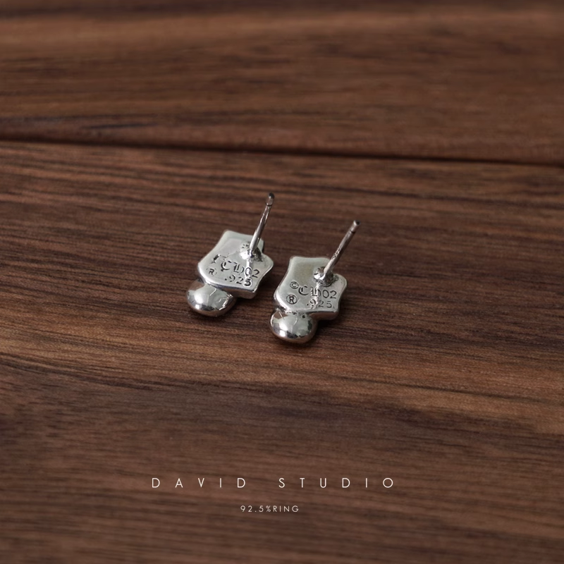 LIP AND TONGUE EARRING