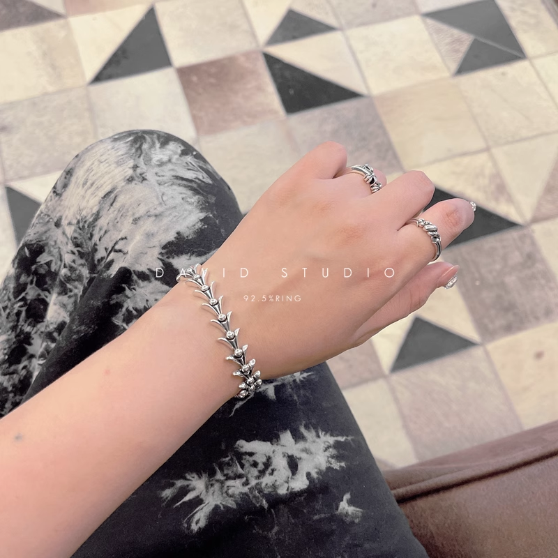 CROSSTAIL BRACELET WITH LOGO TAG