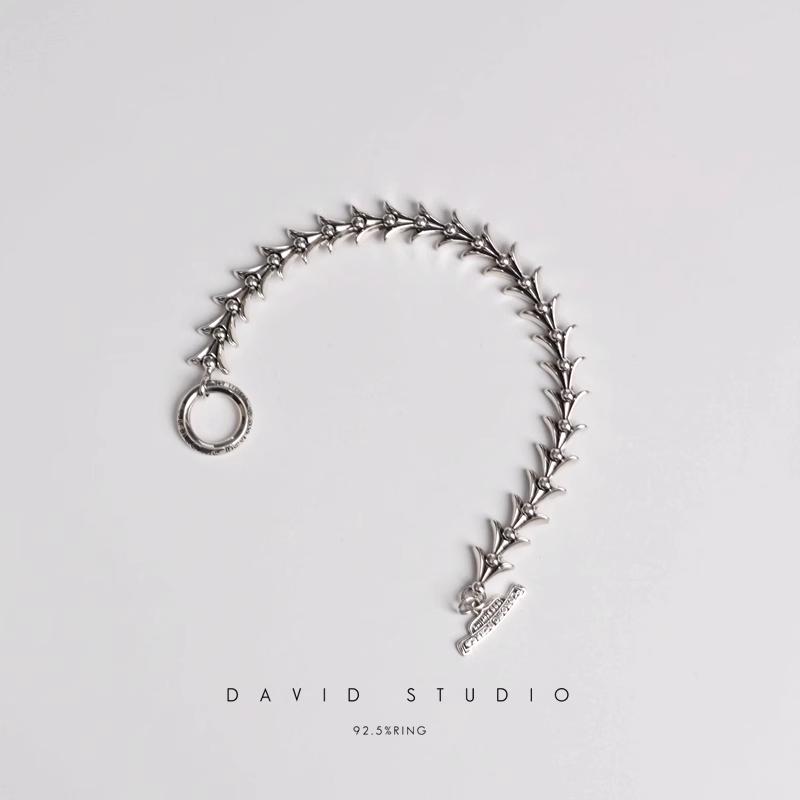 CROSSTAIL BRACELET WITH LOGO TAG