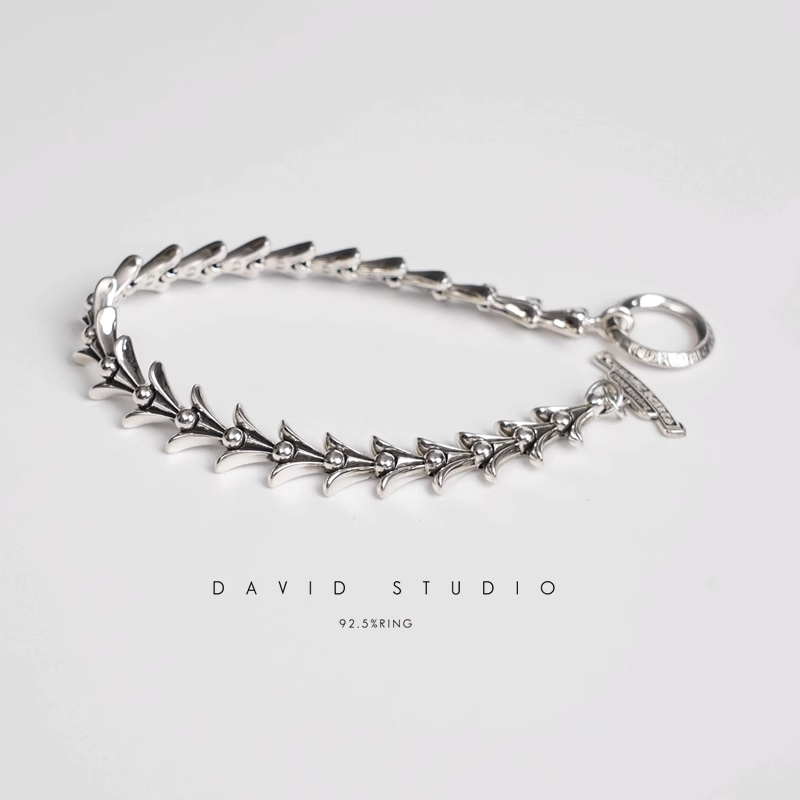 CROSSTAIL BRACELET WITH LOGO TAG