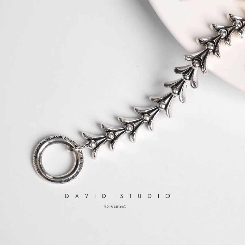 CROSSTAIL BRACELET WITH LOGO TAG