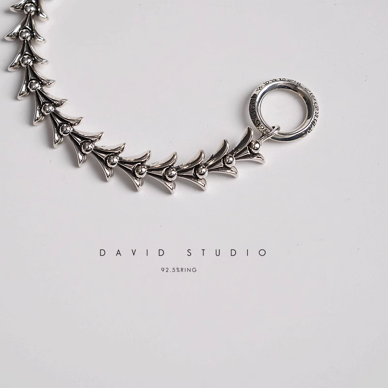 CROSSTAIL BRACELET WITH LOGO TAG