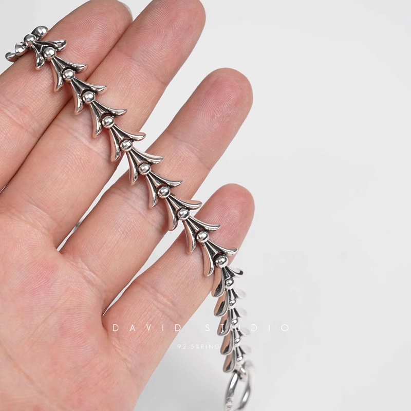 CROSSTAIL BRACELET WITH LOGO TAG