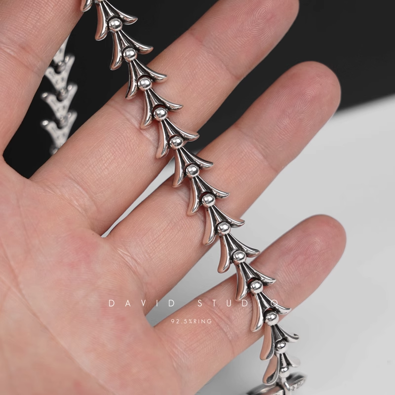 CROSSTAIL BRACELET WITH LOGO TAG