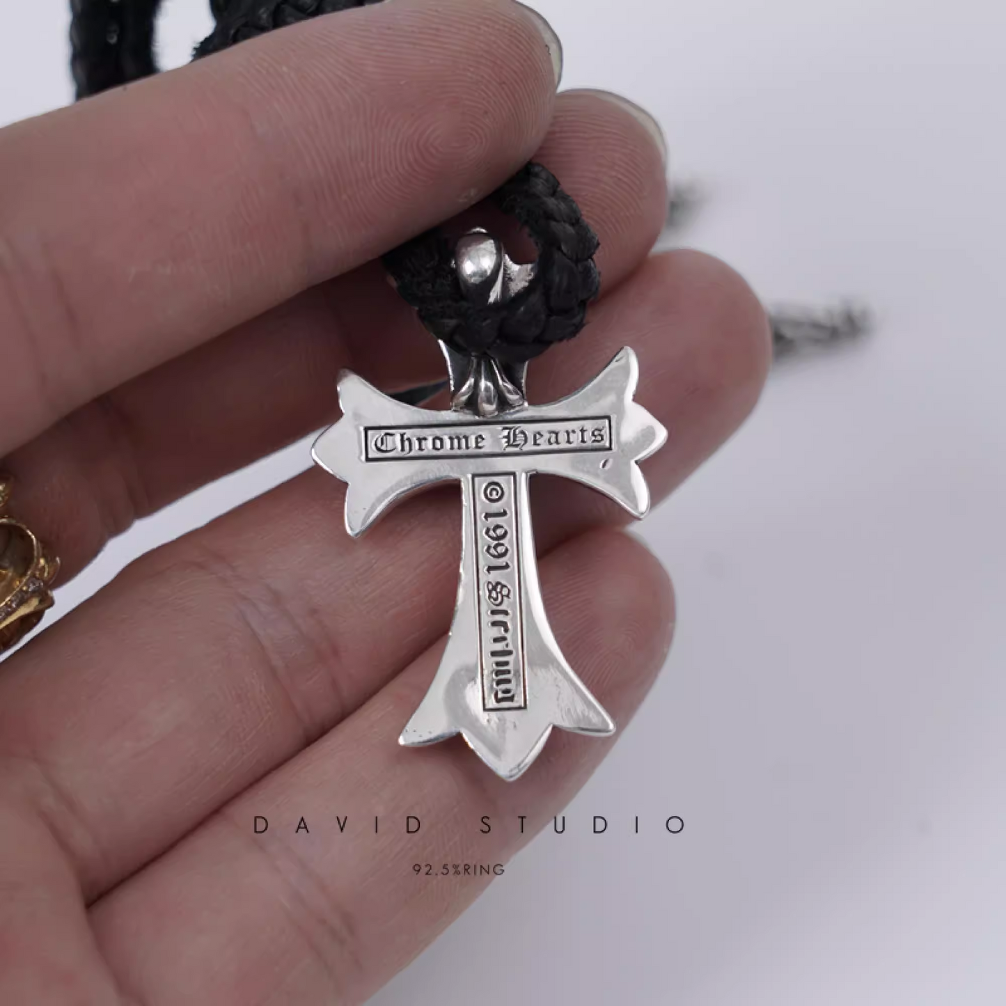 SMALL CROSS PENDANT – LEATHER BRAID