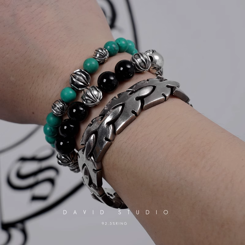TURQUOISE BEAD BRACELET 8MM (4 SILVER BEADS)