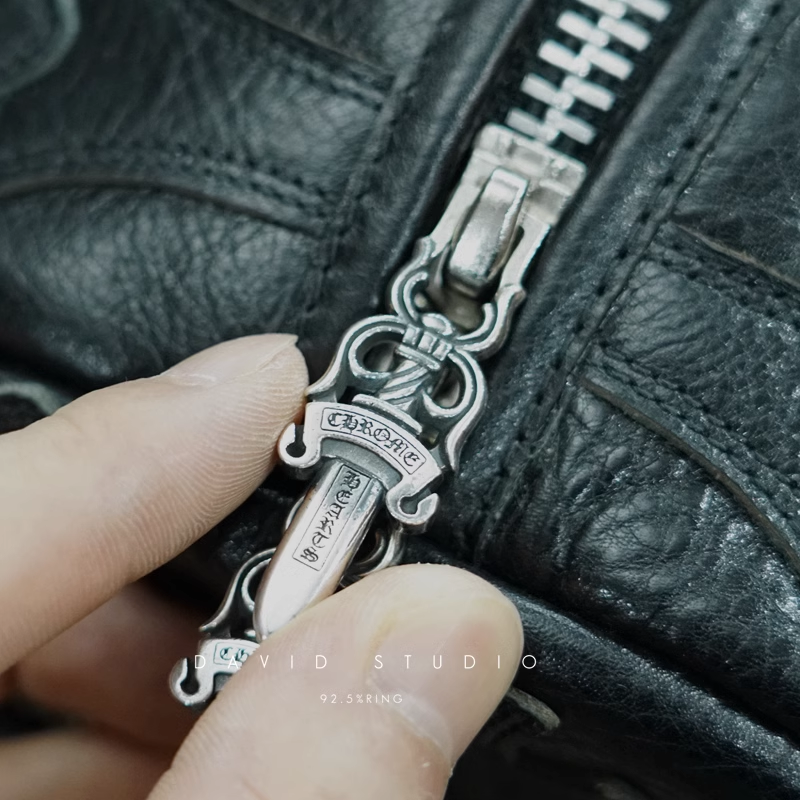Chrome Hearts Crosshatched laser-cut patchwork single-shoulder duffle bag