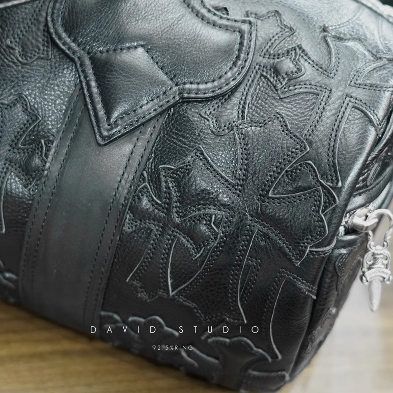 Chrome Hearts Crosshatched laser-cut patchwork single-shoulder duffle bag