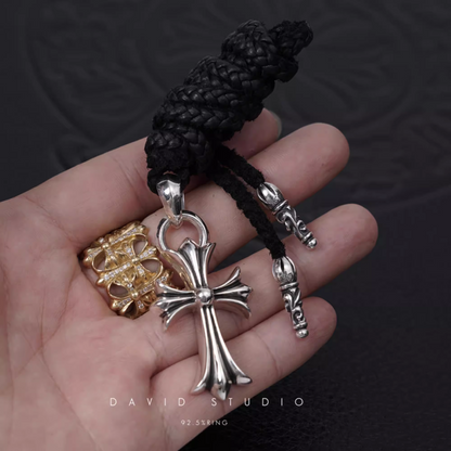 SMALL CROSS PENDANT WITH BAIL – LEATHER BRAID