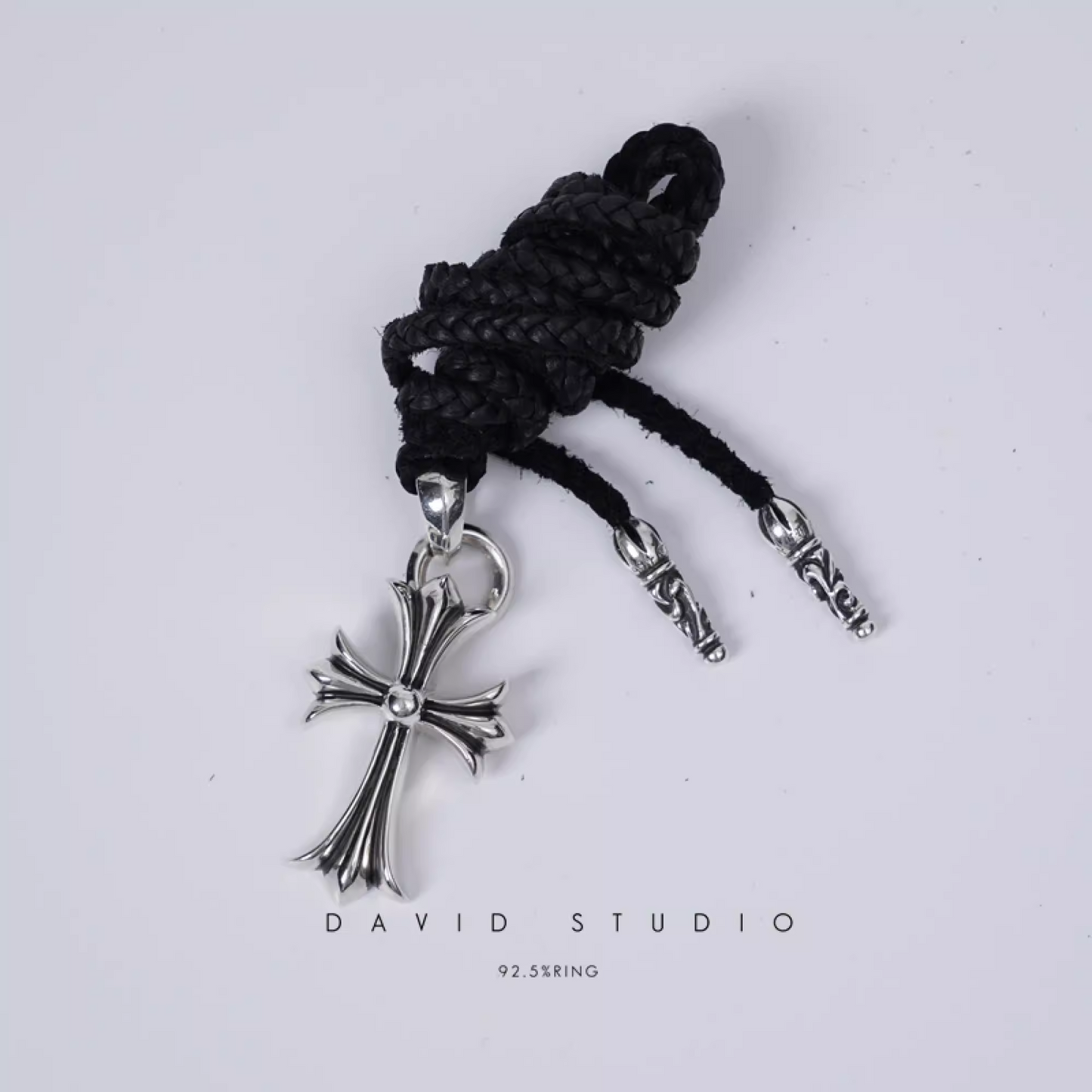 SMALL CROSS PENDANT WITH BAIL – LEATHER BRAID
