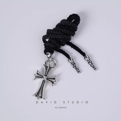 SMALL CROSS PENDANT WITH BAIL – LEATHER BRAID