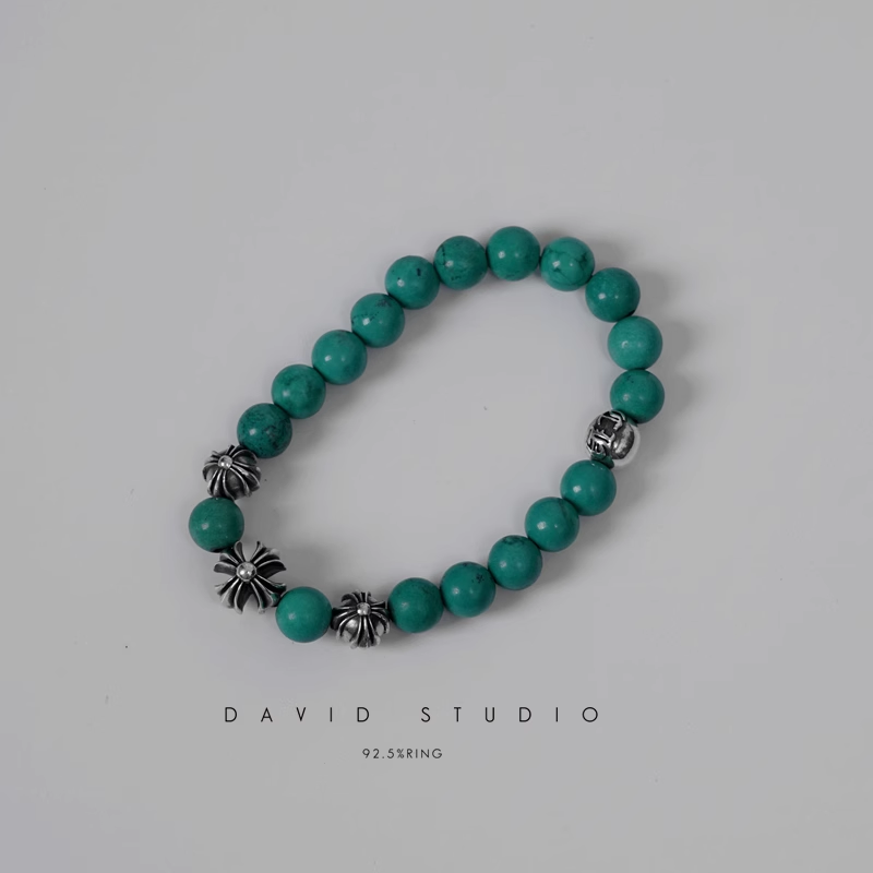 TURQUOISE BEAD BRACELET 8MM (4 SILVER BEADS)
