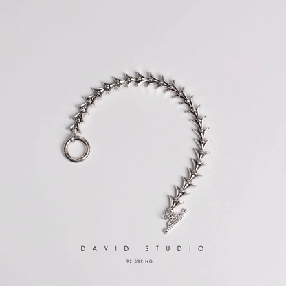 CROSSTAIL BRACELET WITH LOGO TAG