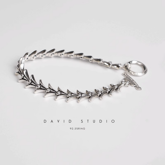 CROSSTAIL BRACELET WITH LOGO TAG