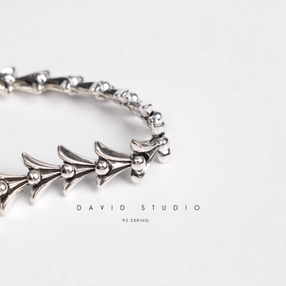 CROSSTAIL BRACELET WITH LOGO TAG