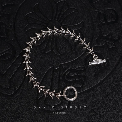 CROSSTAIL BRACELET WITH LOGO TAG