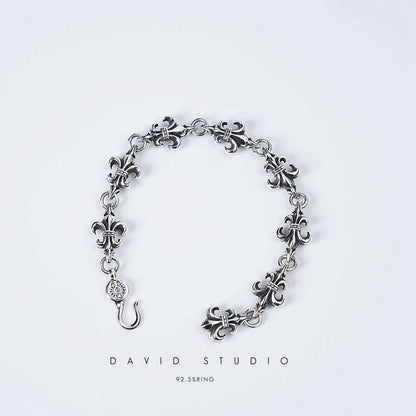 BS FLEUR CROSS CUT OUT LINK BRACELET