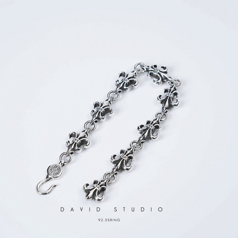 BS FLEUR CROSS CUT OUT LINK BRACELET