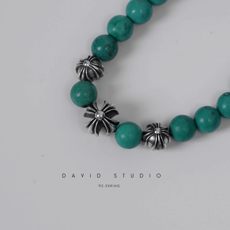 TURQUOISE BEAD BRACELET 8MM (4 SILVER BEADS)