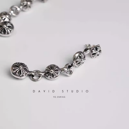 CROSSBALL THREE DROP EARRING
