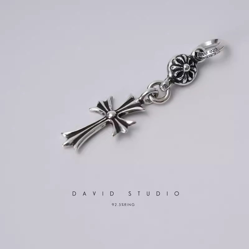 TINY CH CROSS WITH ONE SILVER BALL CHARM