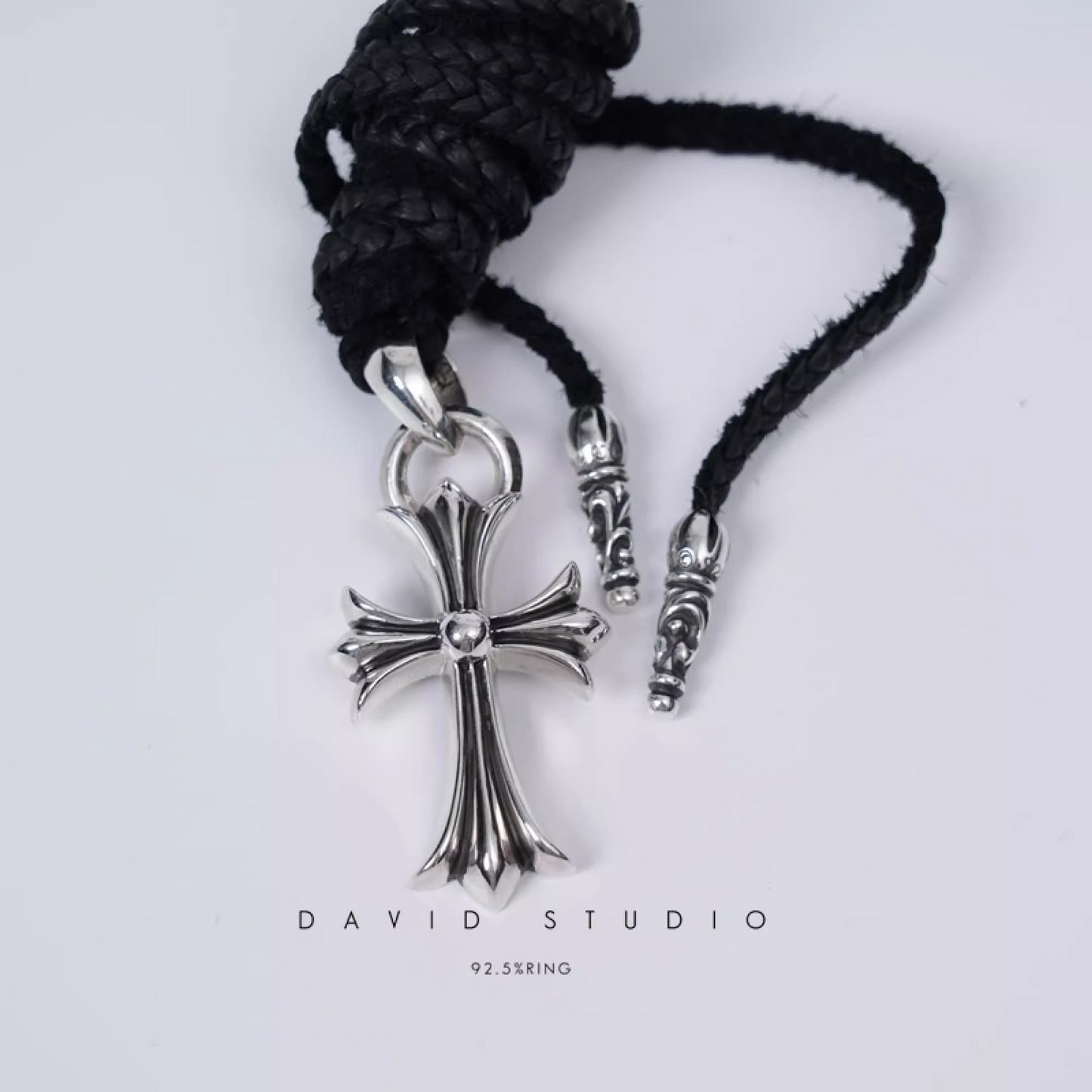 SMALL CROSS PENDANT WITH BAIL – LEATHER BRAID