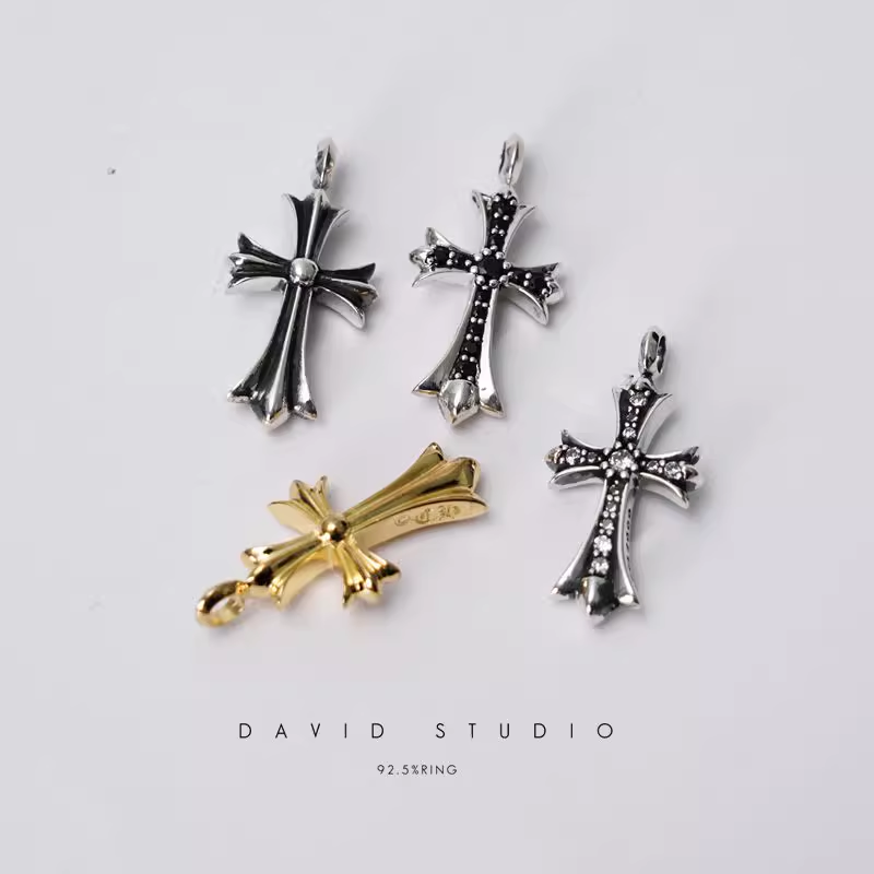 SMALL CROSS CHARM WITH DIAMONDS
