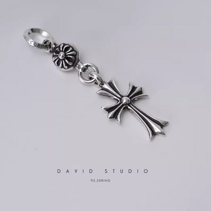TINY CH CROSS WITH ONE SILVER BALL CHARM