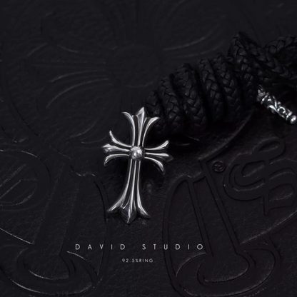 SMALL CROSS PENDANT – LEATHER BRAID