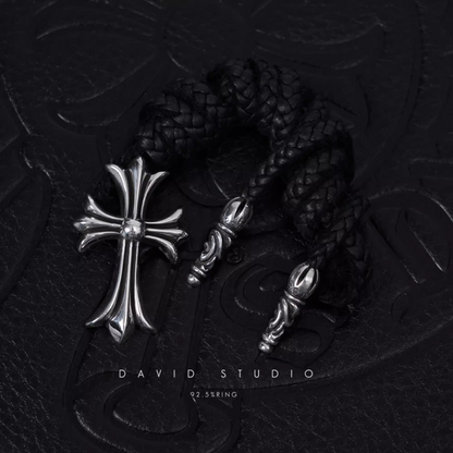 SMALL CROSS PENDANT – LEATHER BRAID