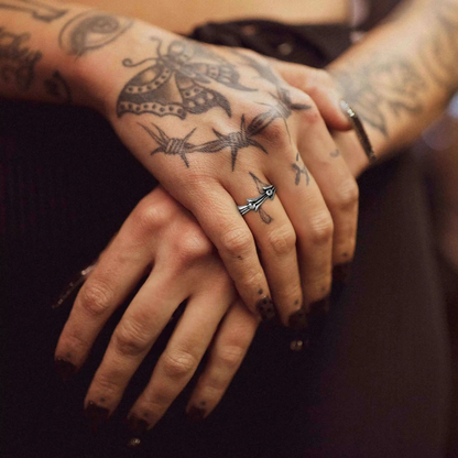 CROSS TAIL RING