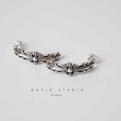 DOUBLE FLORAL CROSS HOOP EARRING