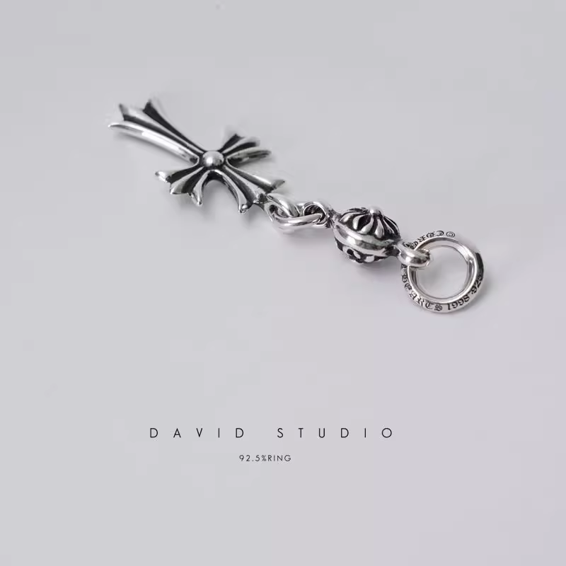 TINY CH CROSS WITH ONE SILVER BALL CHARM