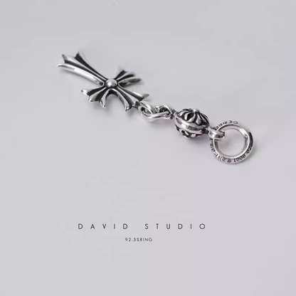 TINY CH CROSS WITH ONE SILVER BALL CHARM