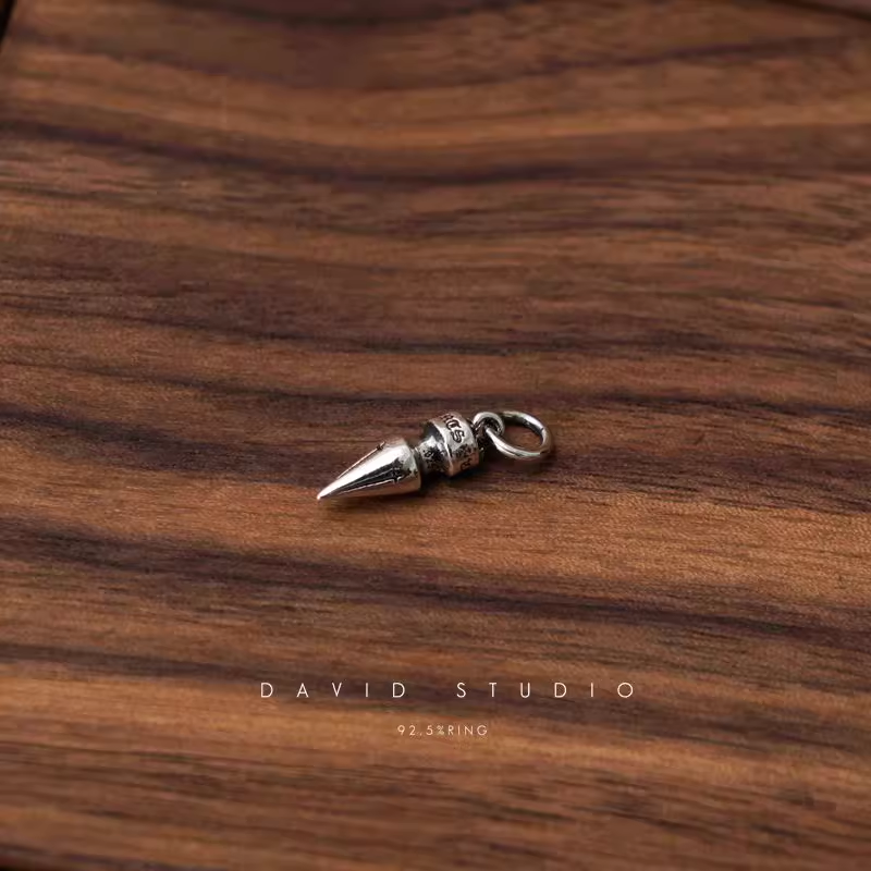 SMALL SPIKE CHARM