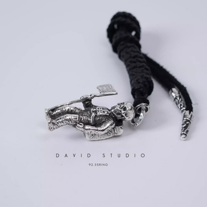 FOTI ASTRONAUT PENDANT – LEATHER BRAID