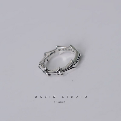 CROSS TAIL RING