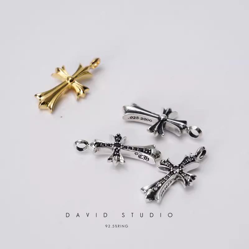 SMALL CROSS CHARM WITH DIAMONDS