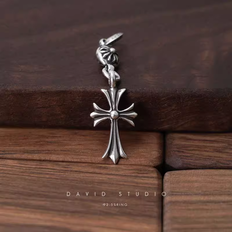 TINY CH CROSS WITH ONE SILVER BALL CHARM