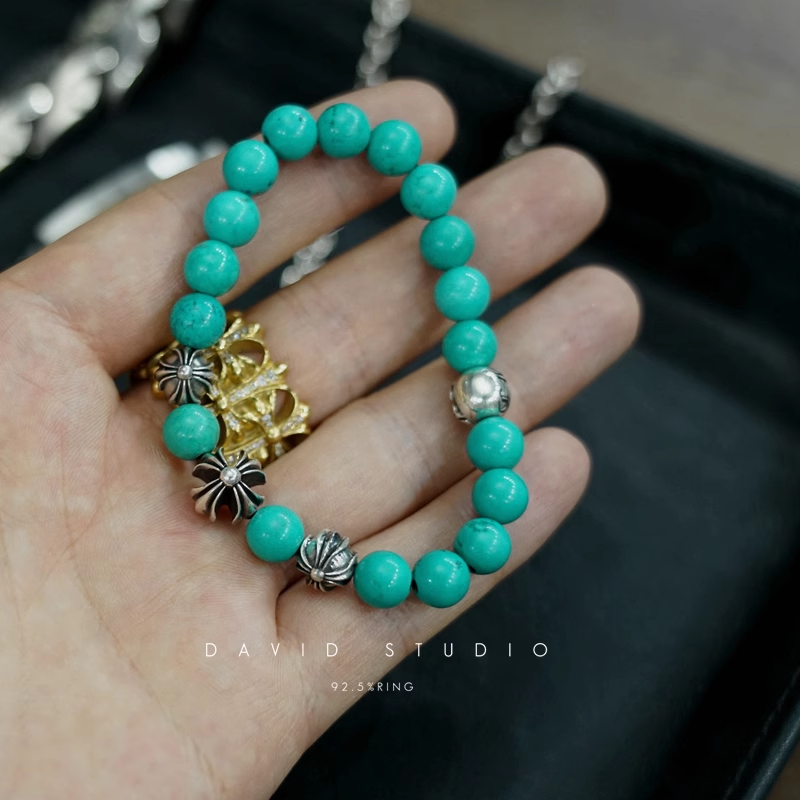 TURQUOISE BEAD BRACELET 8MM (4 SILVER BEADS)