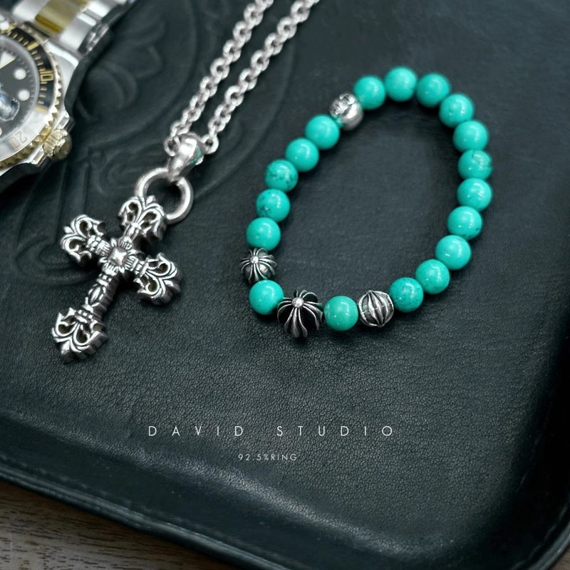 TURQUOISE BEAD BRACELET 8MM (4 SILVER BEADS)
