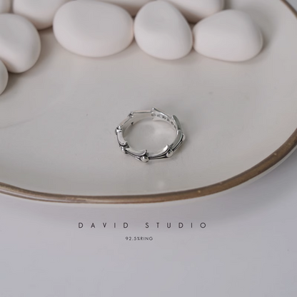 CROSS TAIL RING
