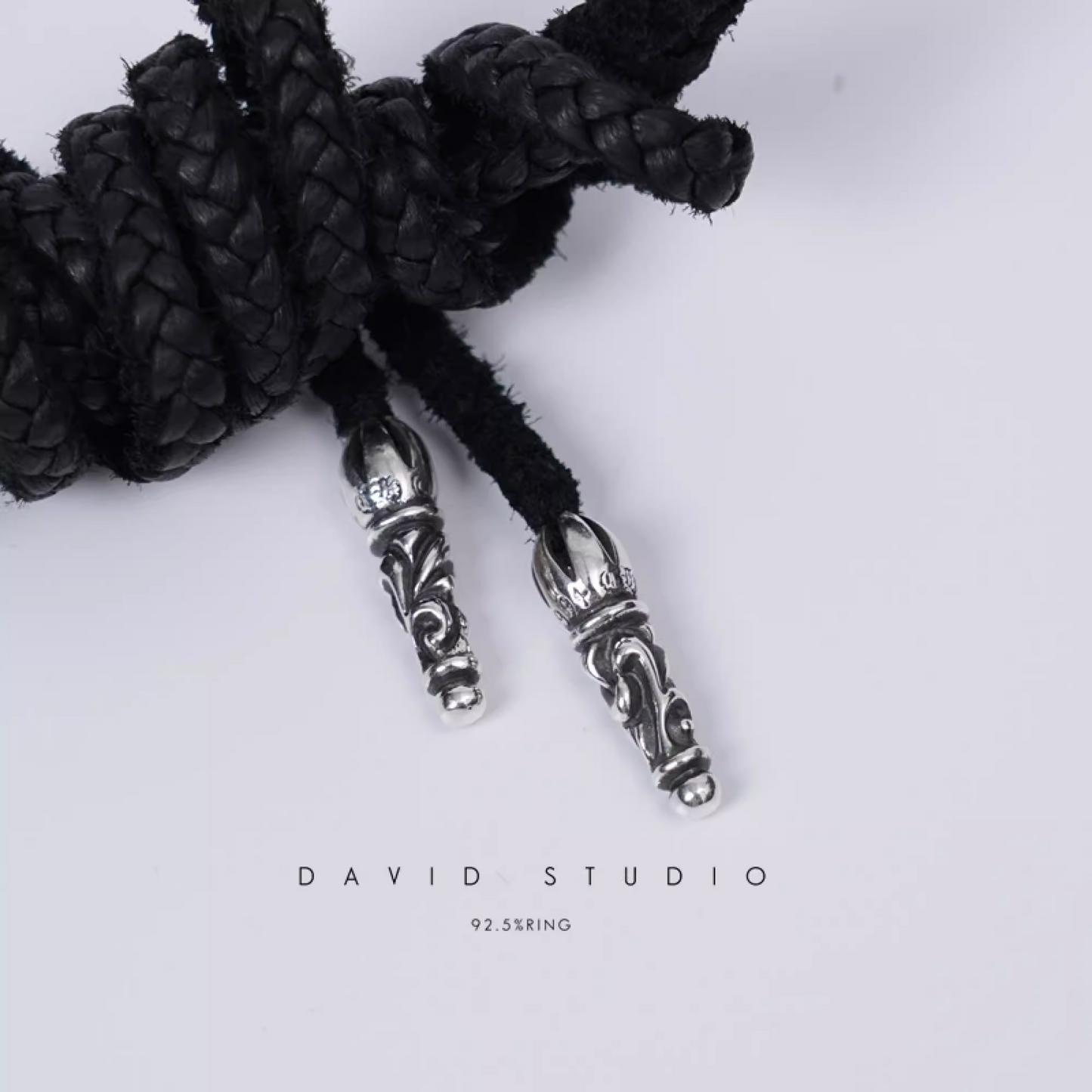 SMALL CROSS PENDANT – LEATHER BRAID