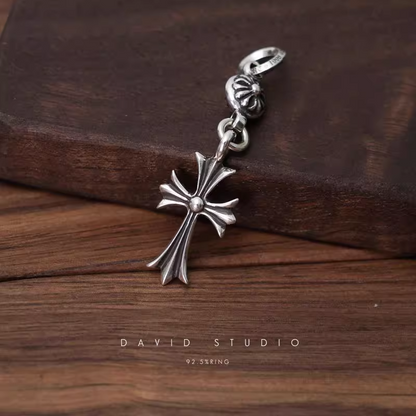 TINY CH CROSS WITH ONE SILVER BALL CHARM