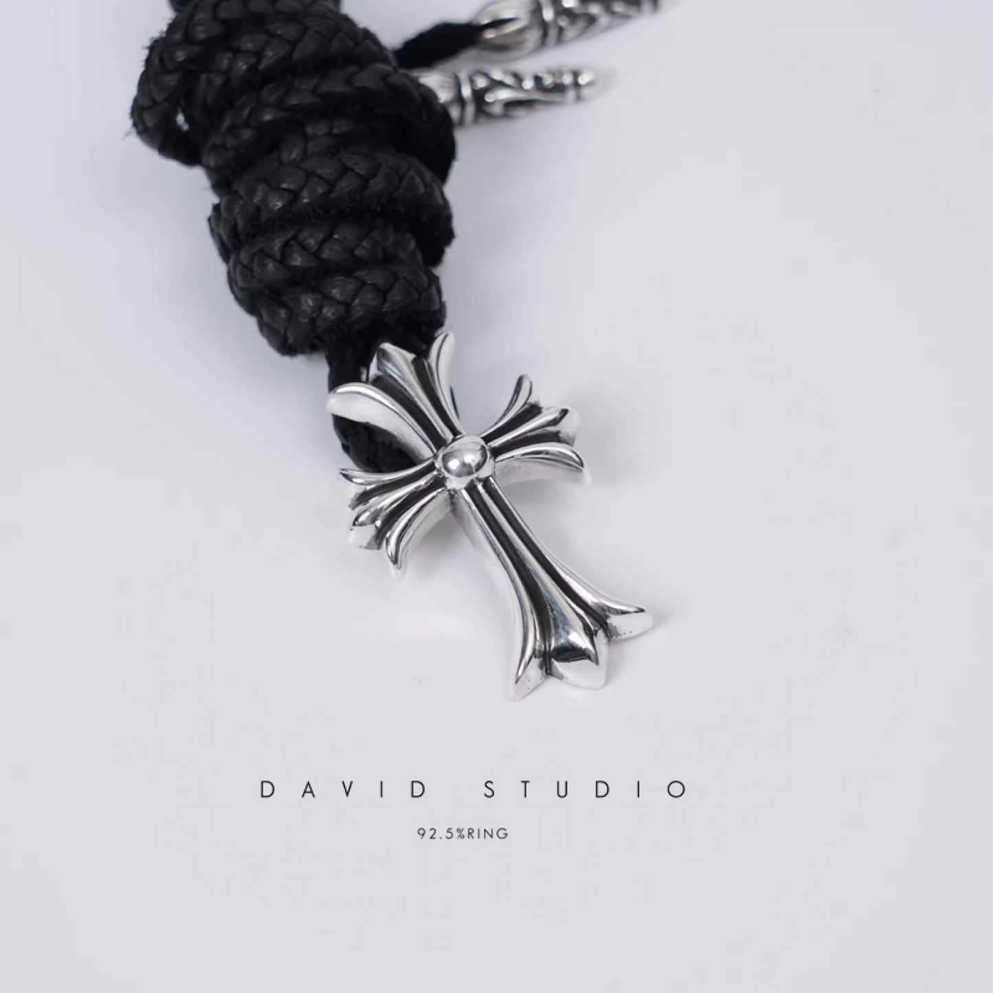 SMALL CROSS PENDANT – LEATHER BRAID