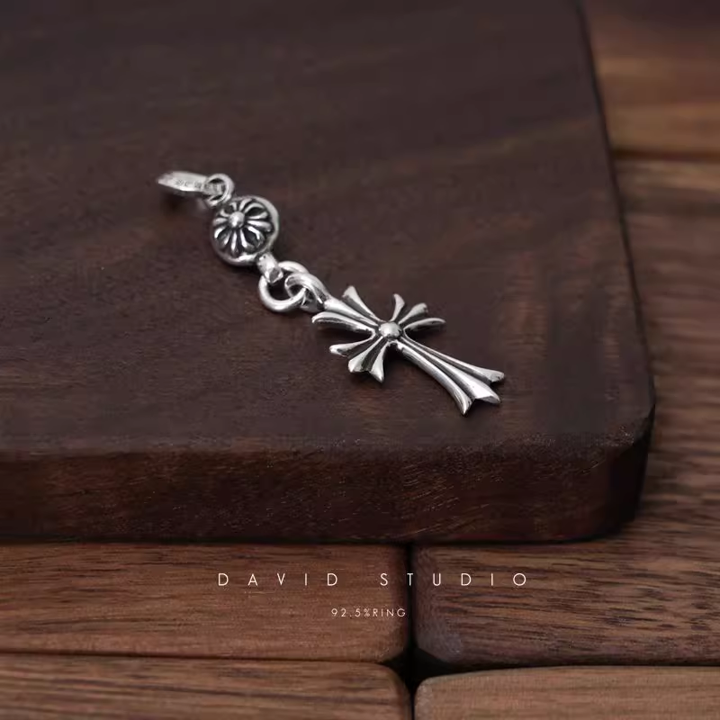 TINY CH CROSS WITH ONE SILVER BALL CHARM