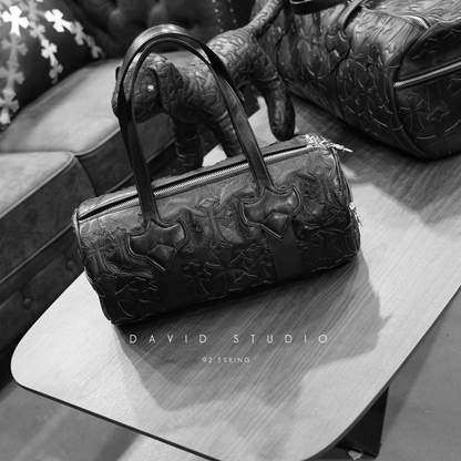 Chrome Hearts Crosshatched laser-cut patchwork single-shoulder duffle bag