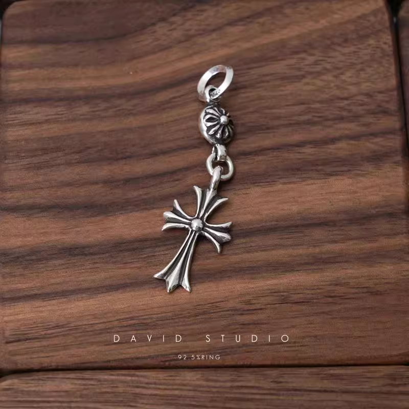 TINY CH CROSS WITH ONE SILVER BALL CHARM