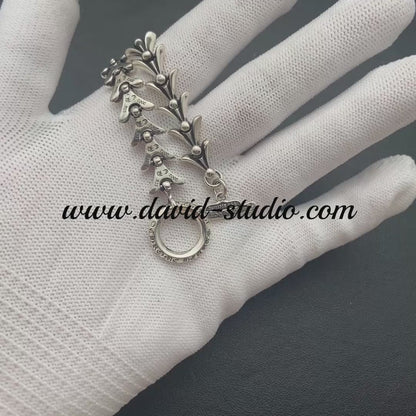 CROSSTAIL BRACELET WITH LOGO TAG